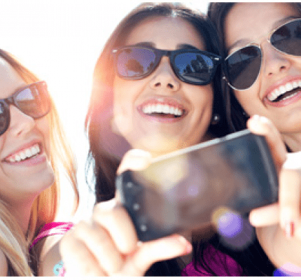 Women taking selfie
